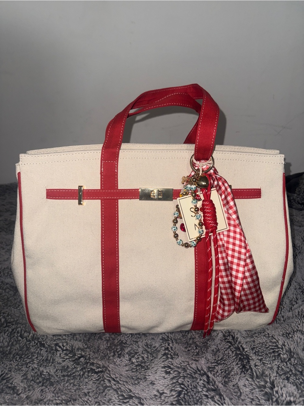 Sol and Mer Canvas Tote Bag with Red Trim and Charm